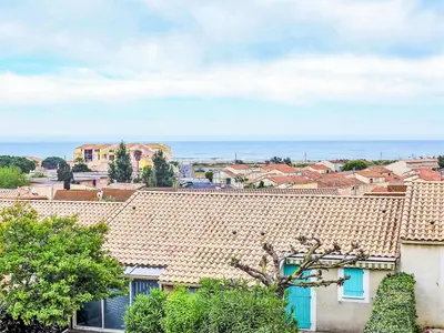 a view of a town with roofs at Holiday Home Bora Bora 2-3 by Interhome in Gruissan