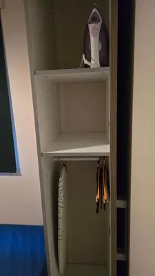 a closet with a white shelf and a cup at ZEN Mobil Home Occitanie 6P Tout confort & Climatisation in Port-la-Nouvelle