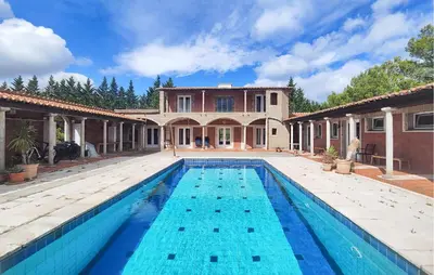 an exterior view of a house with a swimming pool at Amazing Home In Cazelles, Agel in Agel