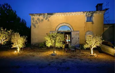 a house with a car parked in front of it at Amazing Home In Cazelles, Agel in Agel