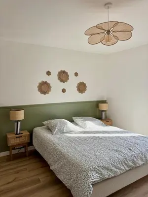 a bedroom with a bed and a ceiling fan at Le Petit Faubourg - Cocooning and bright - Cité in Carcassonne