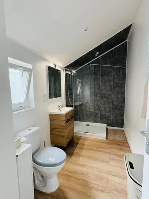 a bathroom with a toilet sink and a shower at Maison indépendante l Climatisation l Extérieur in Castres