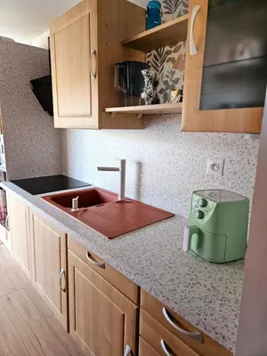 a kitchen with a sink and a counter top at Studio Conteneur in Cruscades