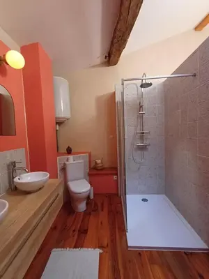 a bathroom with a shower and a toilet and a sink at SAINT-JULIA - Studio in Saint-Julia