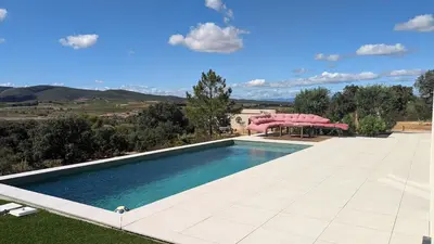 a swimming pool in the yard of a house at Oxyzenvilla 11200 Saint-André-de-Roquelongue in Saint-André-de-Roquelongue