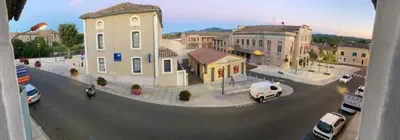a view of a city with cars parked on a street at Cosy Room Trèbes in Trèbes