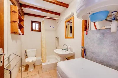 a bathroom with a toilet and a sink and a tub at Chateau st-auriol - magnanerie in Lagrasse