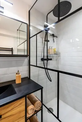 a bathroom with a sink and a shower at Darja in Carcassonne