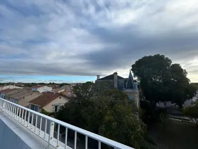 a view of a city from a balcony of a building at L'Escapade Narbonnaise in Narbonne