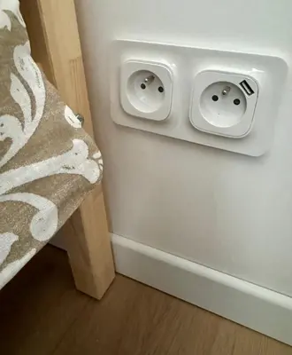 a corner of a room with two speakers on a wall at Saint-Germain T2 Residence Apartment in Carcassonne