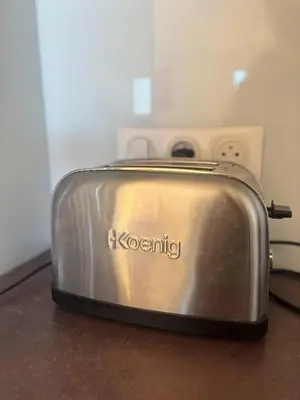a toaster sitting on top of a counter at Elégant T3, vue sur le port - Grande terrasse in Gruissan