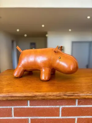 a wooden toy horse sitting on top of a table at Elégant T3, vue sur le port - Grande terrasse in Gruissan