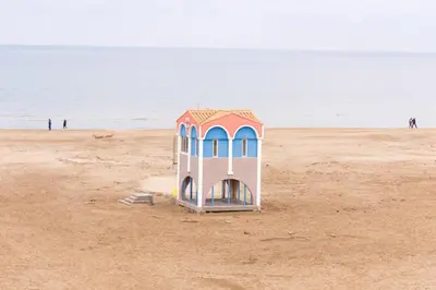 a small lifeguard station on the beach at La Perle de la Mer in Port-la-Nouvelle