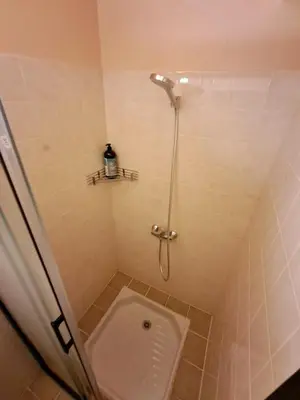 a bathroom with a shower with a toilet in it at La Glycine in Portel-des-Corbières