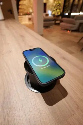 a smart phone sitting on top of a table at Gîte La Choule in Mourvilles-Hautes