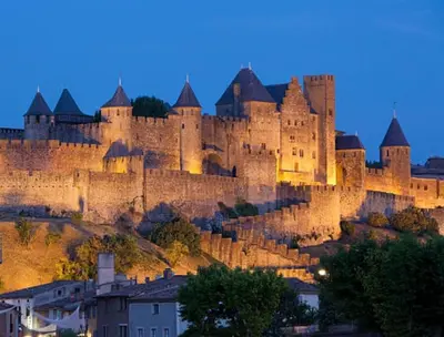 a large castle sitting on top of a hill at Studio terrasse au calme près de Narbonne in Montredon