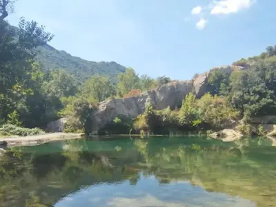 a lake in the middle of a mountain at Mobil home 6 pers avec terrasse à Fenouillet - API-1-52-314 in Fenouillet