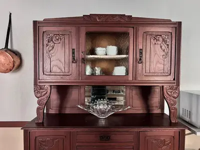 a large wooden hutch with a bowl in it at Grand gîte proche des lacs in Prémian