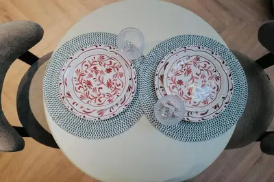 two plates sitting on top of a table at Maison Franz - 800m des Grands Buffets - Garage in Narbonne