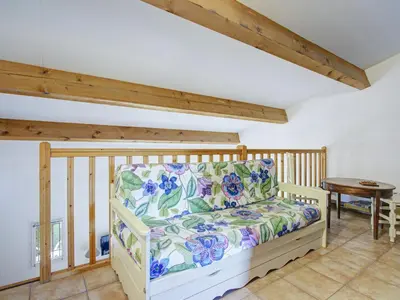 a room with a couch and a table in it at PMinervois I N02 Villa 3P6 in Homps