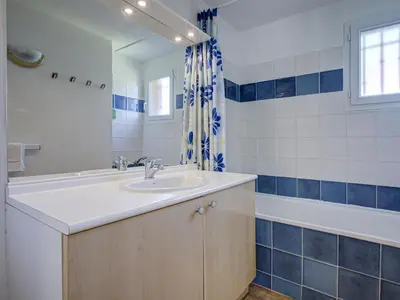 a bathroom with a sink and a bath tub at P Minervois L N02 Villa 3P6 in Homps
