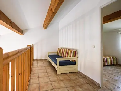a small room with a bed in the corner at P Minervois C N02 Villa 3P6 in Homps