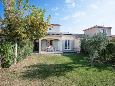 a house with a yard in front of it at P Minervois U N04 VILLA 3P6 in Homps