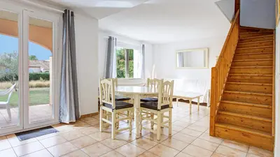 a dining room with a table and chairs at P Minervois I N01 Villa 4P8 in Homps