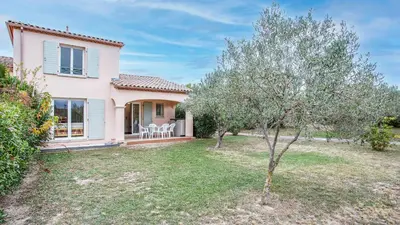a bedroom with a bed and a desk and a window at P Minervois I N01 Villa 4P8 in Homps