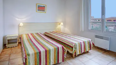 a living room with a couch and a table at P Minervois I N01 Villa 4P8 in Homps