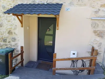 a front door of a house with a blue door at Lagrange in Leychert