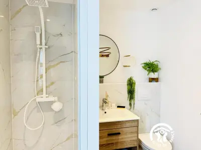 a bathroom with a shower and a sink at La douce echappee in Trèbes