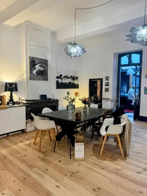 a dining room with a table and chairs at Day rental for Family Reunion, Anniv in Mazères