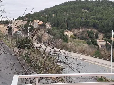 a view of a road with a mountain in the background at Villa Pierrot in Portel-des-Corbières