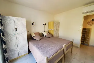 a bedroom with a bed in a room at Le Salvador paisible maisonette pour 4 in Sigean