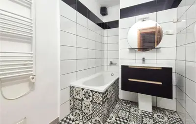 a bathroom with a sink and a bath tub at Gorgeous Home In Villespassans in Villespassans