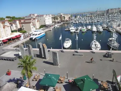 a view of a marina with boats in the water at Gruissan - Villa 6 Pers - Terrasses - Secteur Calme - FR-1-796-102 in Gruissan