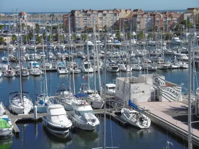 a bunch of boats docked in a harbor at Villa T4 8 pers proche plage Grazel, parking privé et terrasse - FR-1-796-98 in Gruissan