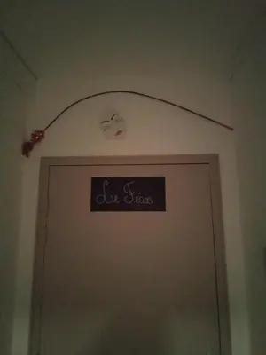 a sign over a door with a heart above it at Le fécos in Limoux