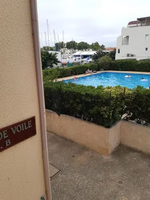 a view of a swimming pool from a building at NOUVEAU 