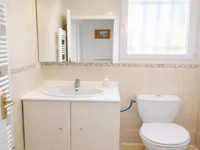 a bathroom with a shower with a tub and a toilet at Detached Family Villa in Les Cammazes in Les Cammazes