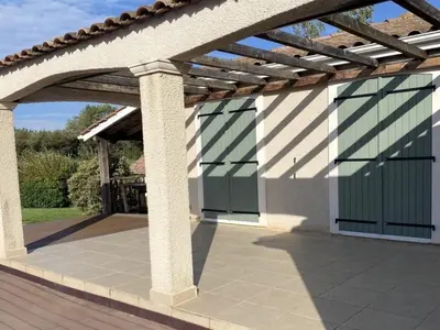 a swimming pool in front of a house at Detached Family Villa in Les Cammazes in Les Cammazes