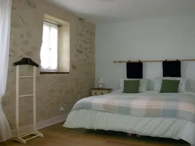 a bedroom with a bed and a book shelf at Holiday Home Gemütliches Ferienhaus in Villautou by Interhome in Villautou