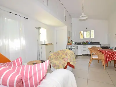 a living room with a couch and a table at Apartment Die kleine Zikade by Interhome in Cesseras