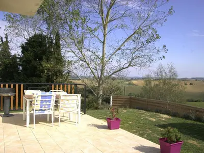a table and chairs sitting on a patio at Holiday Home für 2 Personen und 2 Kinder by Interhome in Villautou