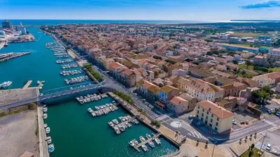 an aerial view of a harbor with boats in the water at Gîte Le Courredou Portel des Corbières in Portel-des-Corbières