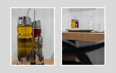 a couple of glass bottles on a table at L'Intime - Cozy & air-conditioned duplex - Near Carcassonne in Pennautier