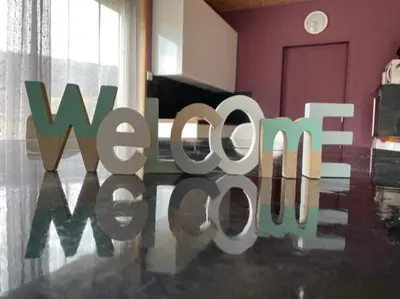 a sign that reads wolf newegg in a room at Les ferrajals in Rouvenac
