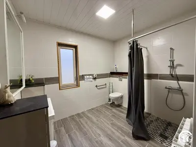 a bathroom with a shower and a toilet at Les ferrajals in Rouvenac
