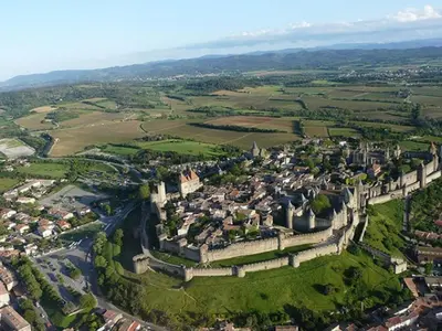 an aerial view of a town with a castle at Mobil home 21m² avec terrasse à Axat - API-1-52-1082 in Axat